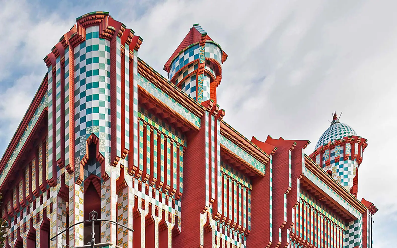 Casa Vicens in Barcelona: Colorful modernist architecture with red brick and ceramic tiles.