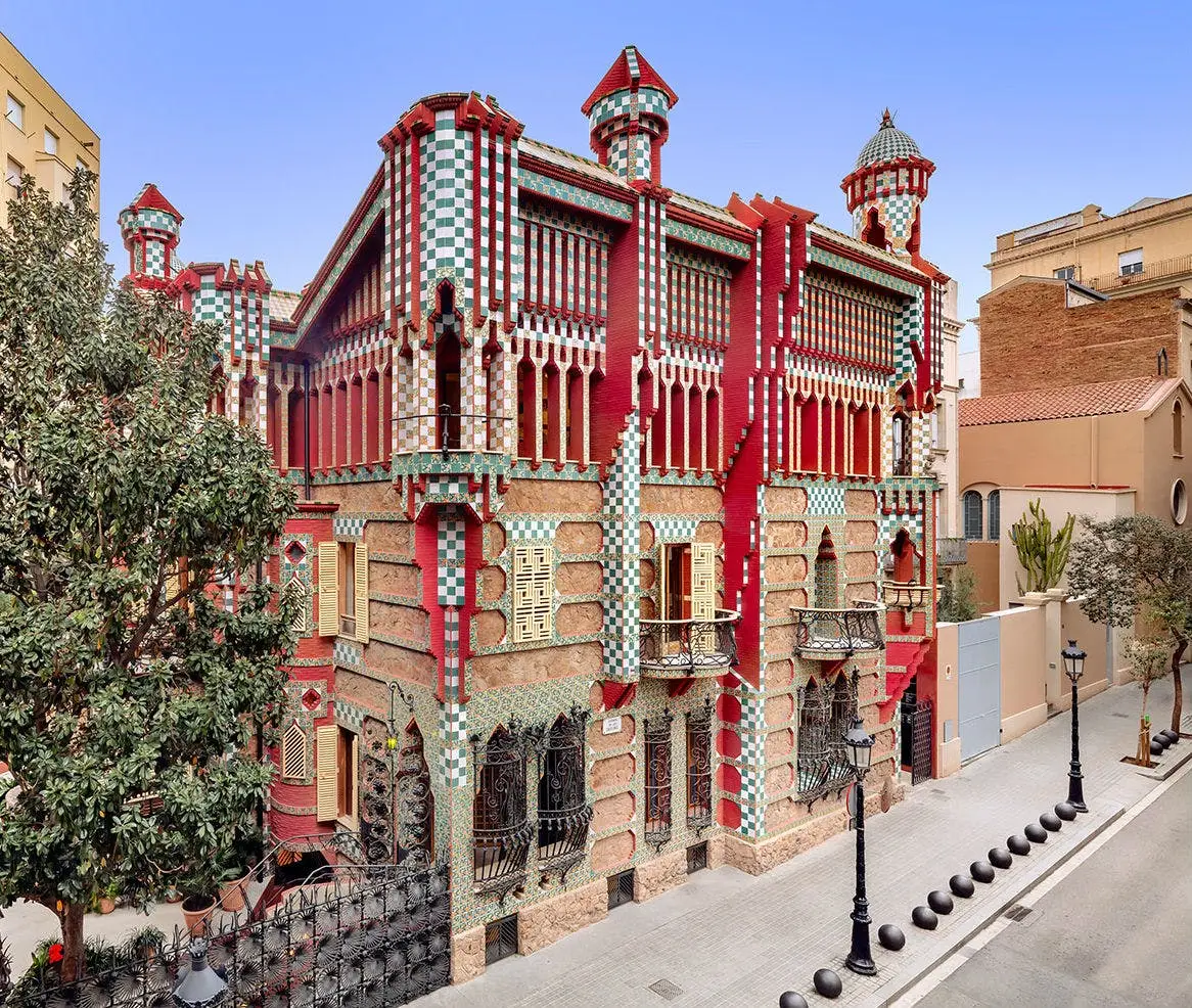 Casa Vicens in Barcelona: Gaudi's colorful early masterpiece with red, green, and white patterned facade.
